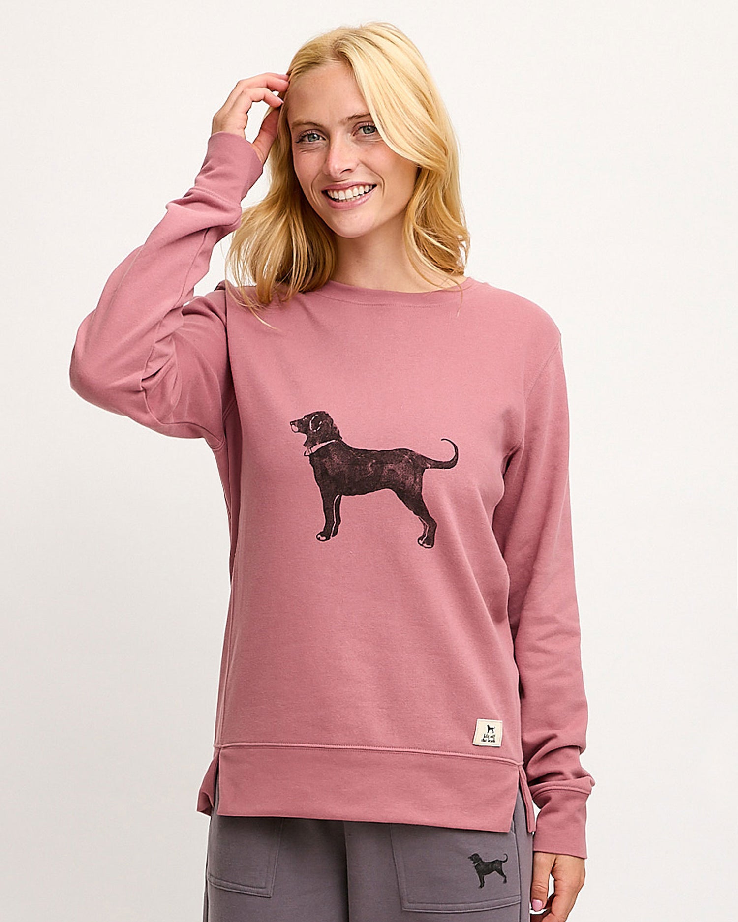 Woman wearing a pink sweatshi