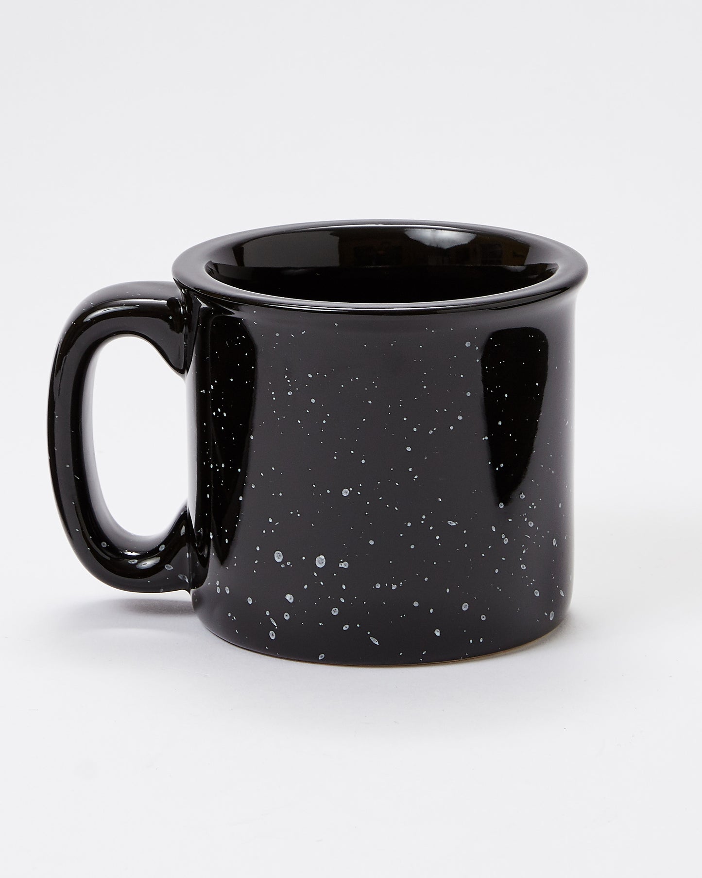 Black speckled mug on a white background