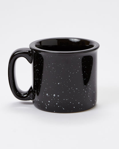 Black speckled mug on a white background