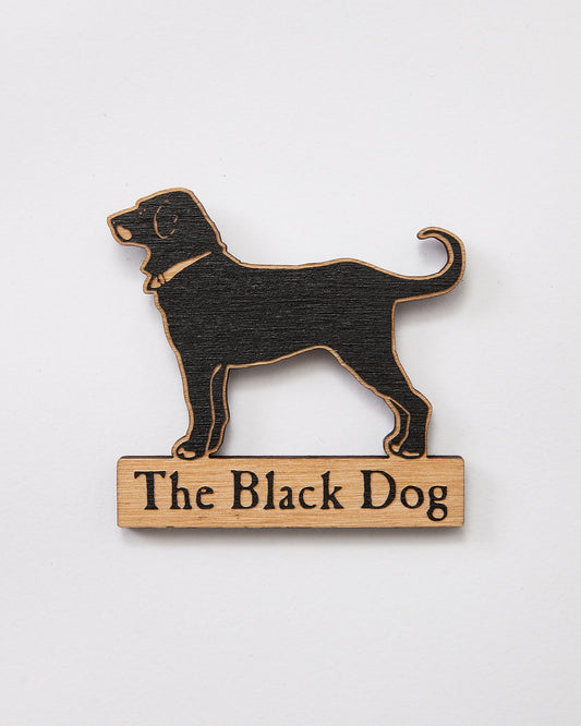 Wooden sign with black dog silhouette